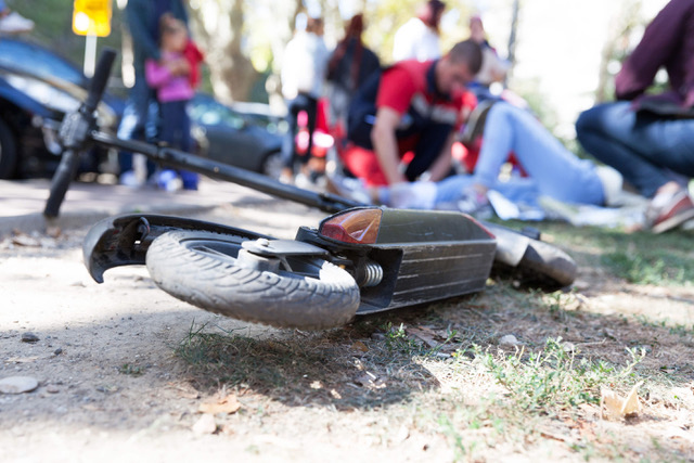 Scooter lies on the side of the road after a scooter accident in Florida.